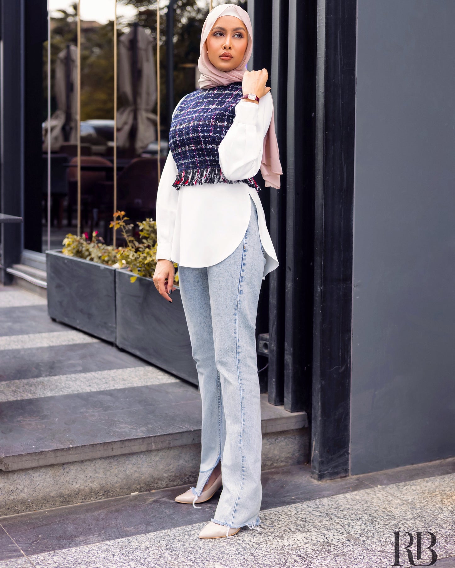 Navy blue cropped vest with satin blouse