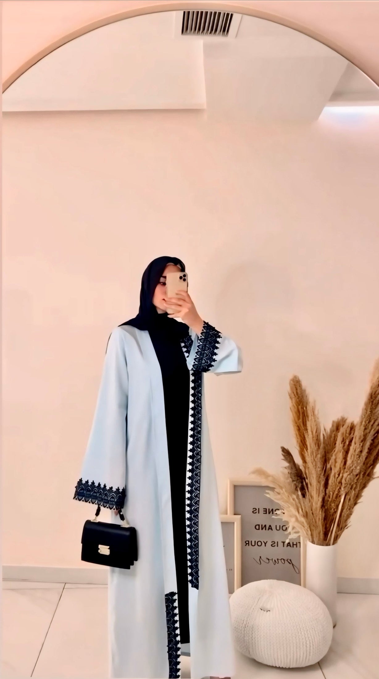 Light blue abaya embroidered with black guipure